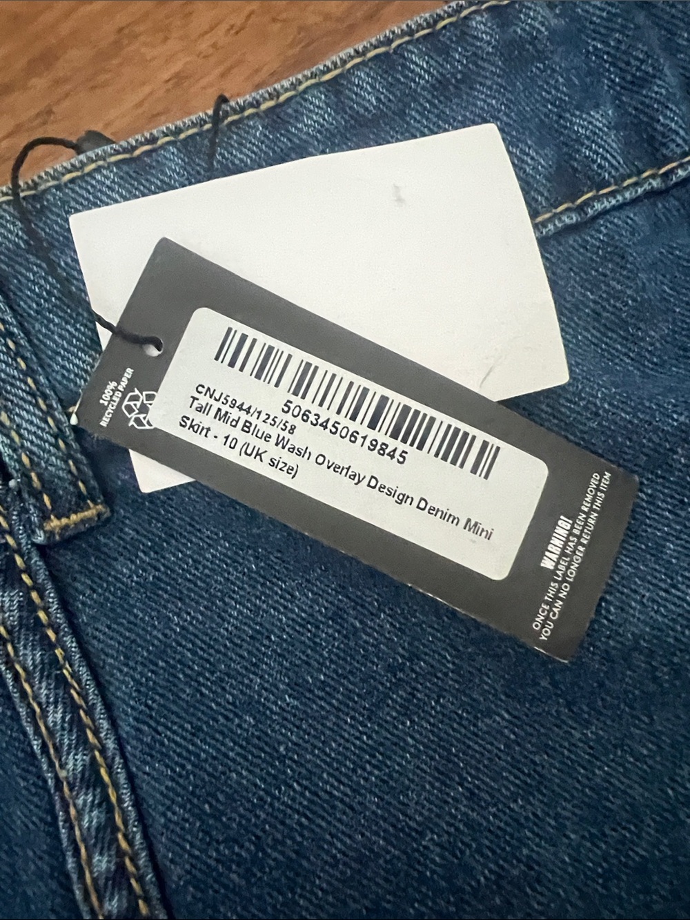 PrettyLittleThing Blue Denim Mini Skirt with Curved Stitching - Picture 3 of 4